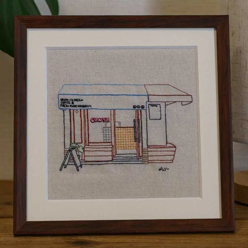 CONTO storefront embroidery